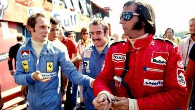 Emerson Fittipaldi (McLaren) e Clay Regazzoni (Ferrari) con Niki Lauda (Ferrari)
