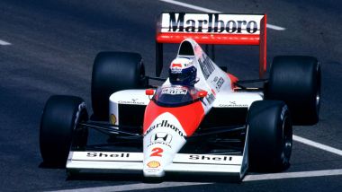 F1 GP Usa 1989: Alain Prost con la McLaren-Honda e il logo Acura sulla visiera del casco