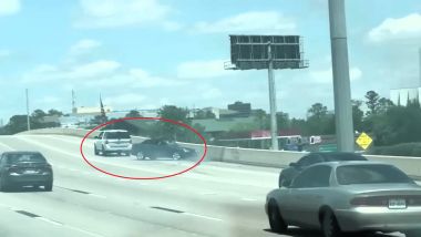 La Saab 9-3 Cabrio trainata al contrario dalla Ford Expedition